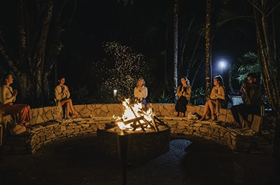 Campfire group wellness retreat at Copal Tree Lodge _ Belize Retreats