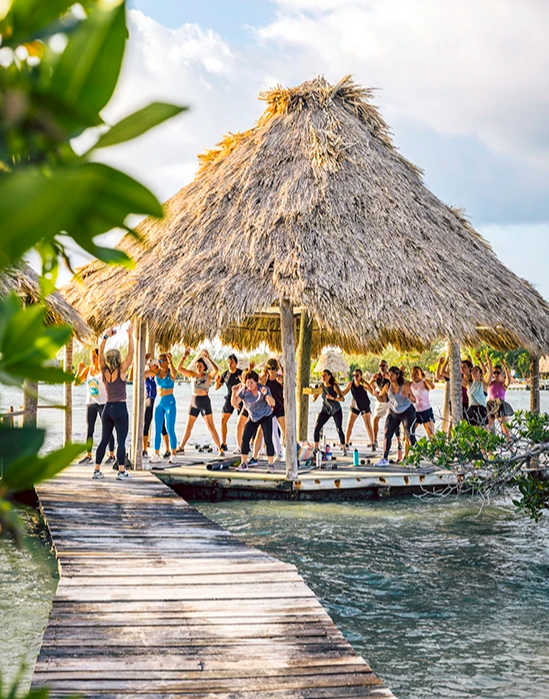 Group-retreat-overwater-on-the-private-island-Thatch-Caye-Resort-_-Belize-Retreats 1