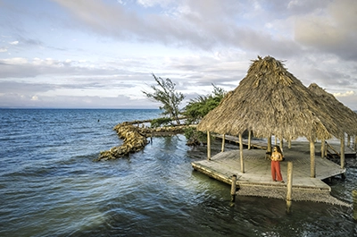 Overwater yoga palapa at Thatch Caye Resort _ Belize Retreats