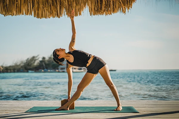 Yoga Retreat at private island Thatch Caye overwater palapa _ Belize Retreats