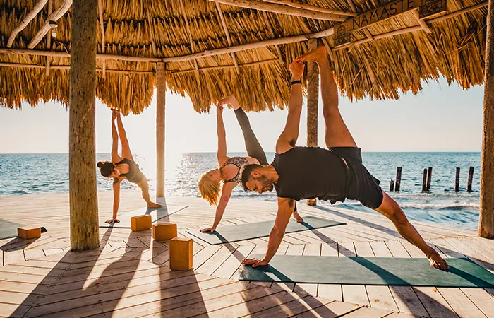 Yoga overwater palapa on private isand Thatch Caye _ Belize Retreats Wellness